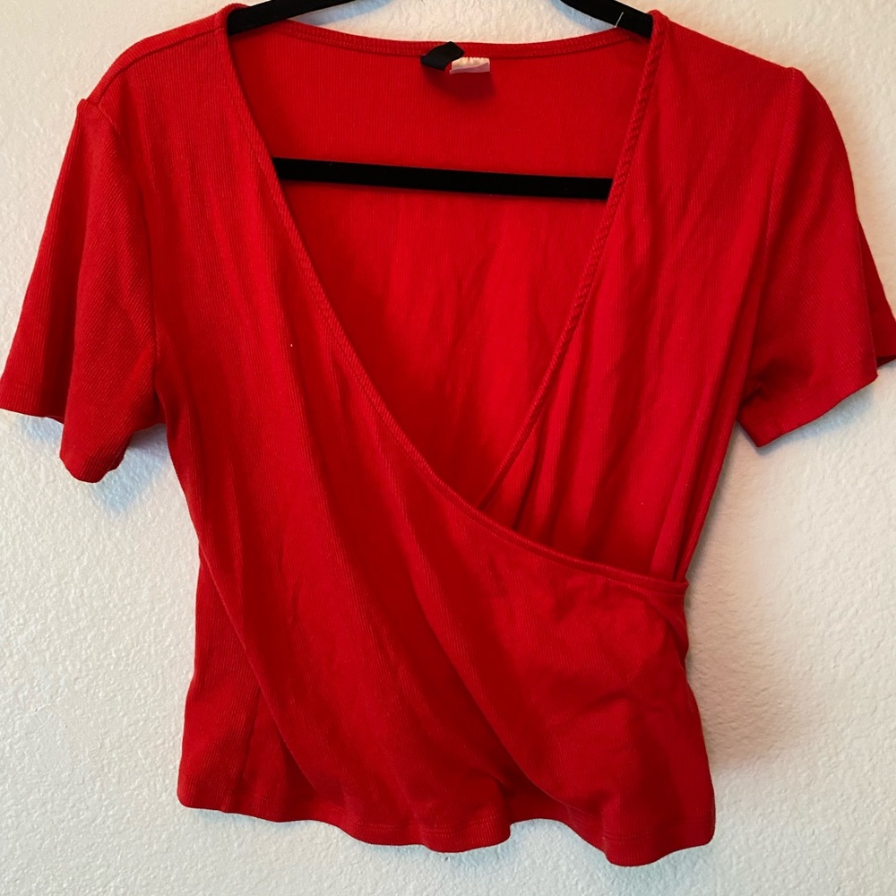 Deep cut red shirt